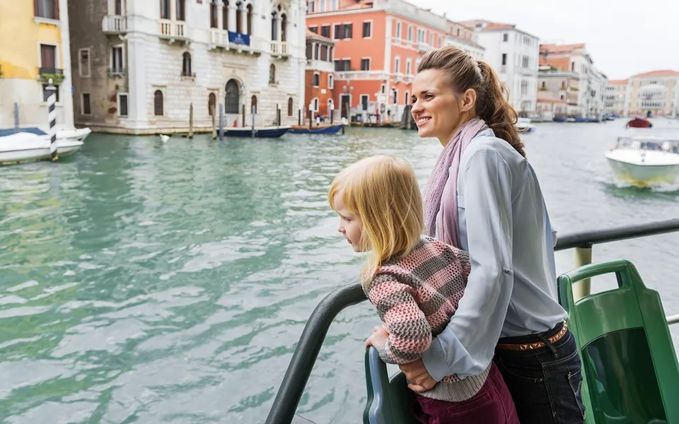 Passengers watching the Grand Canal from a vaporetto