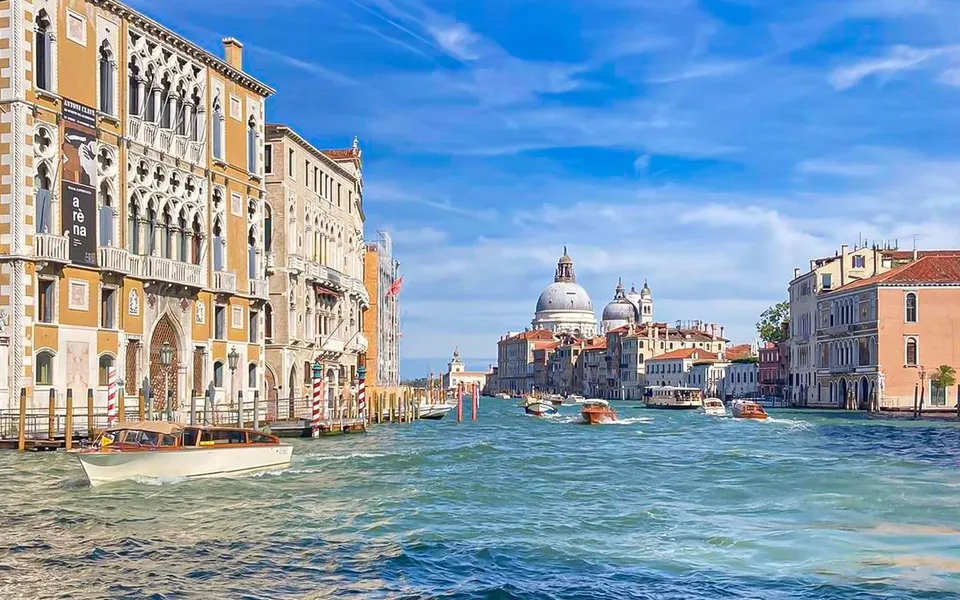 Palaces lining the Grand Canal with Santa Maria della Salute in the distance