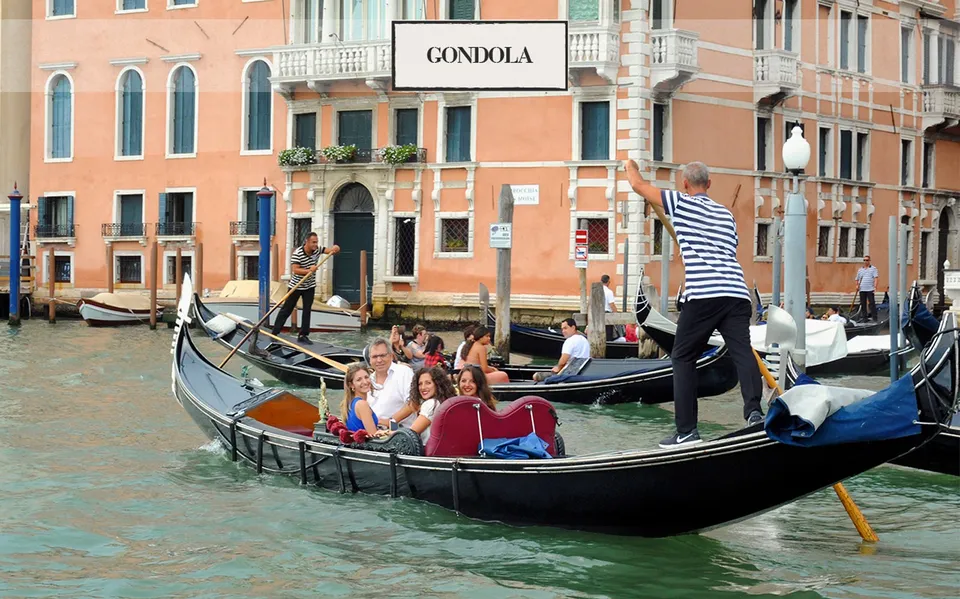 Passengers riding in a shared gondola