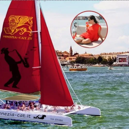 Red catamaran sail on the Venetian lagoon