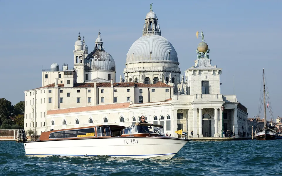 Water taxi passing Santa Maria della Salute