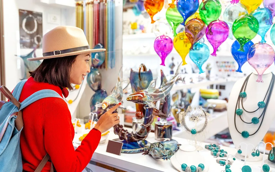 Colourful glass ornaments displayed in a Murano shop