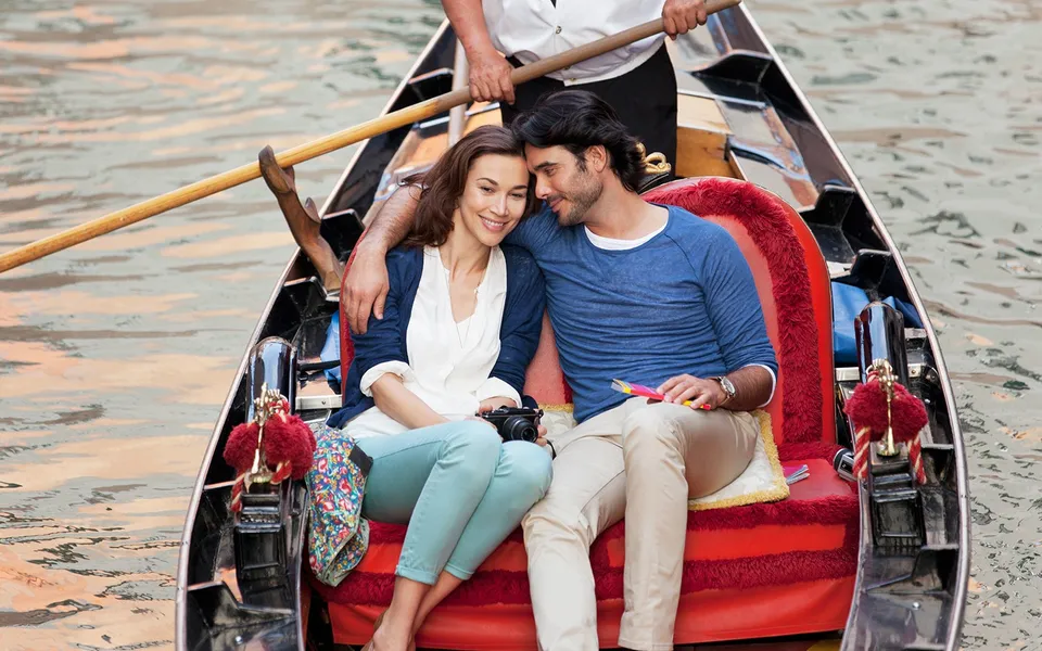 Couple seated together in a private gondola